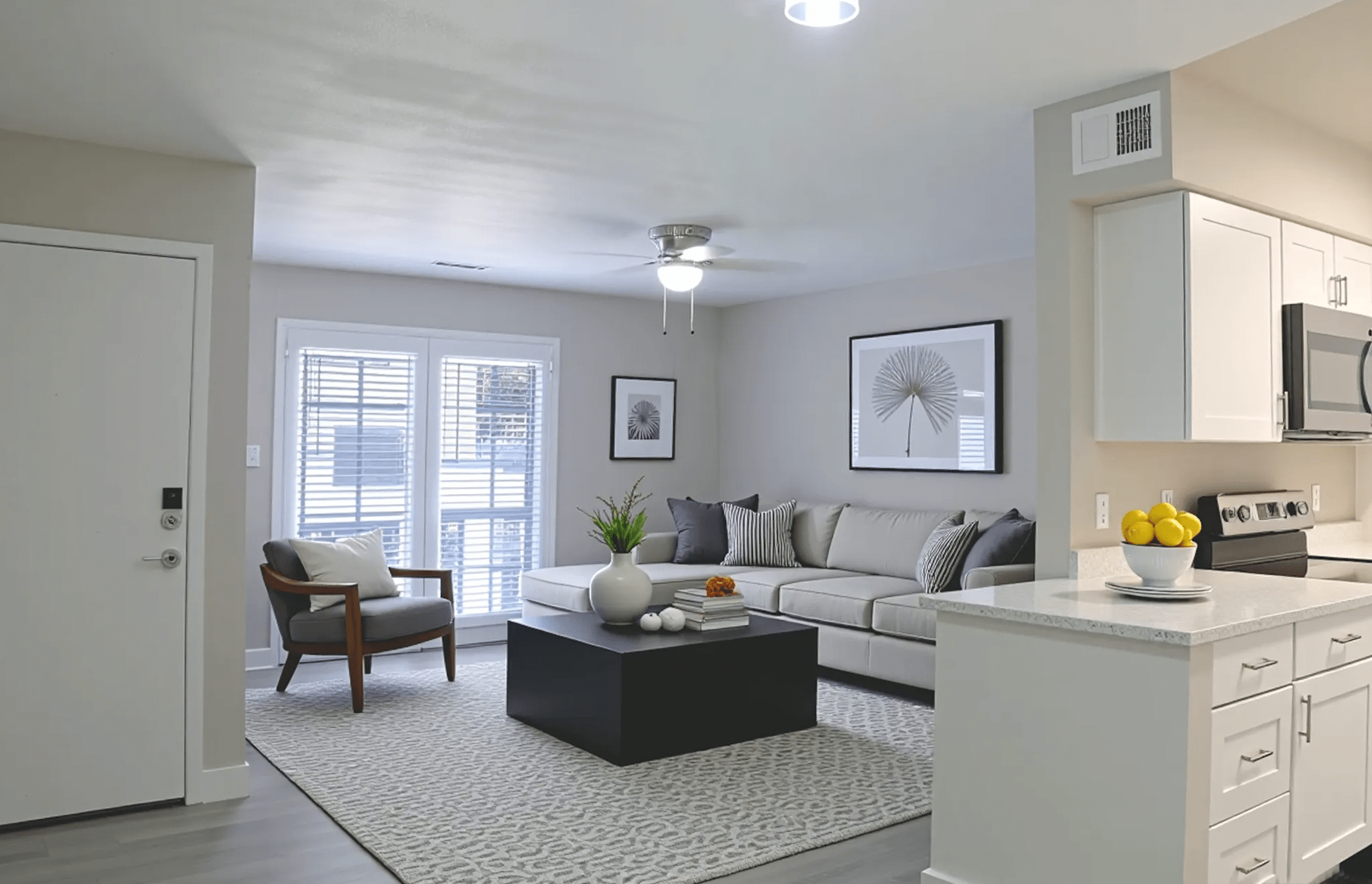 Furnished apartment living area shown — representative home at Stonebridge.