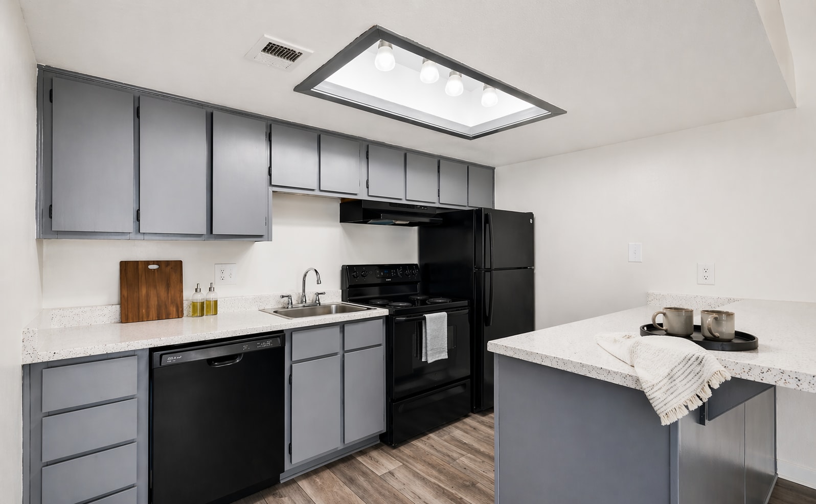 Apartment kitchen — representative home at Windsprings Apartments.