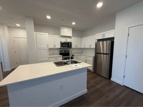 Apartment kitchen — representative home at Mustang Villas.
