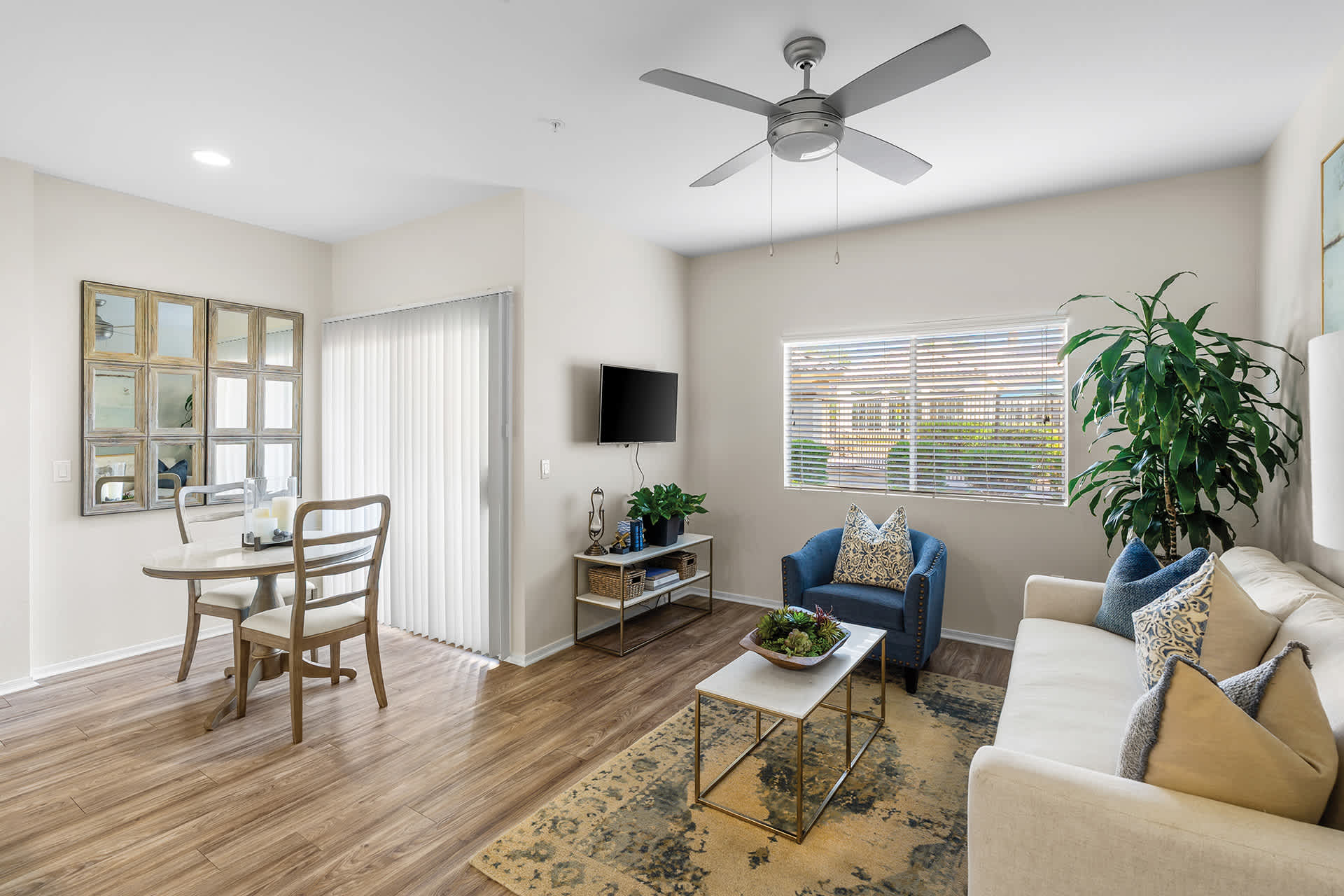 Furnished apartment living area shown — representative home at Sonterra Apartments at Paradise Valley.