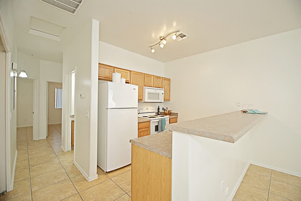 Apartment kitchen — representative home at Palo Brea.