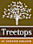 A brown sign with a tree and the words "Treetops at Chester Hollow".