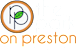 The Park on Preston Apartments logo with a green background.