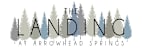 The image is a logo for "The Landing at Arrowhead Springs" with a forest of trees in the background.