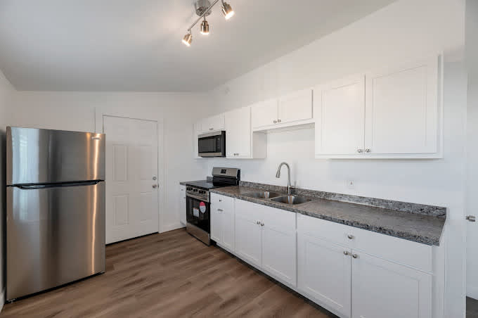 Apartment kitchen — representative home at Desert Green.