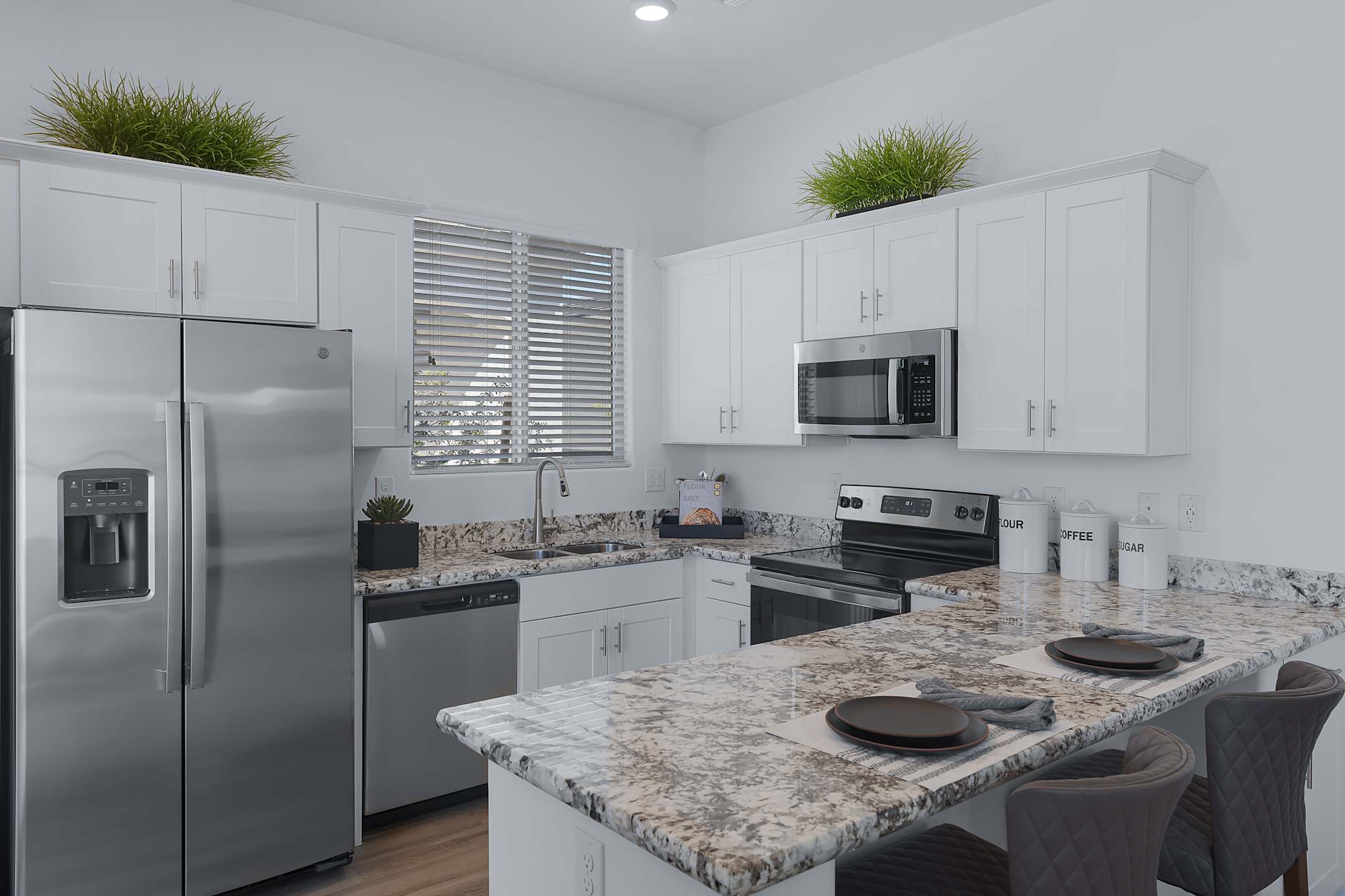 Apartment kitchen — representative home at Avilla Magnolia.