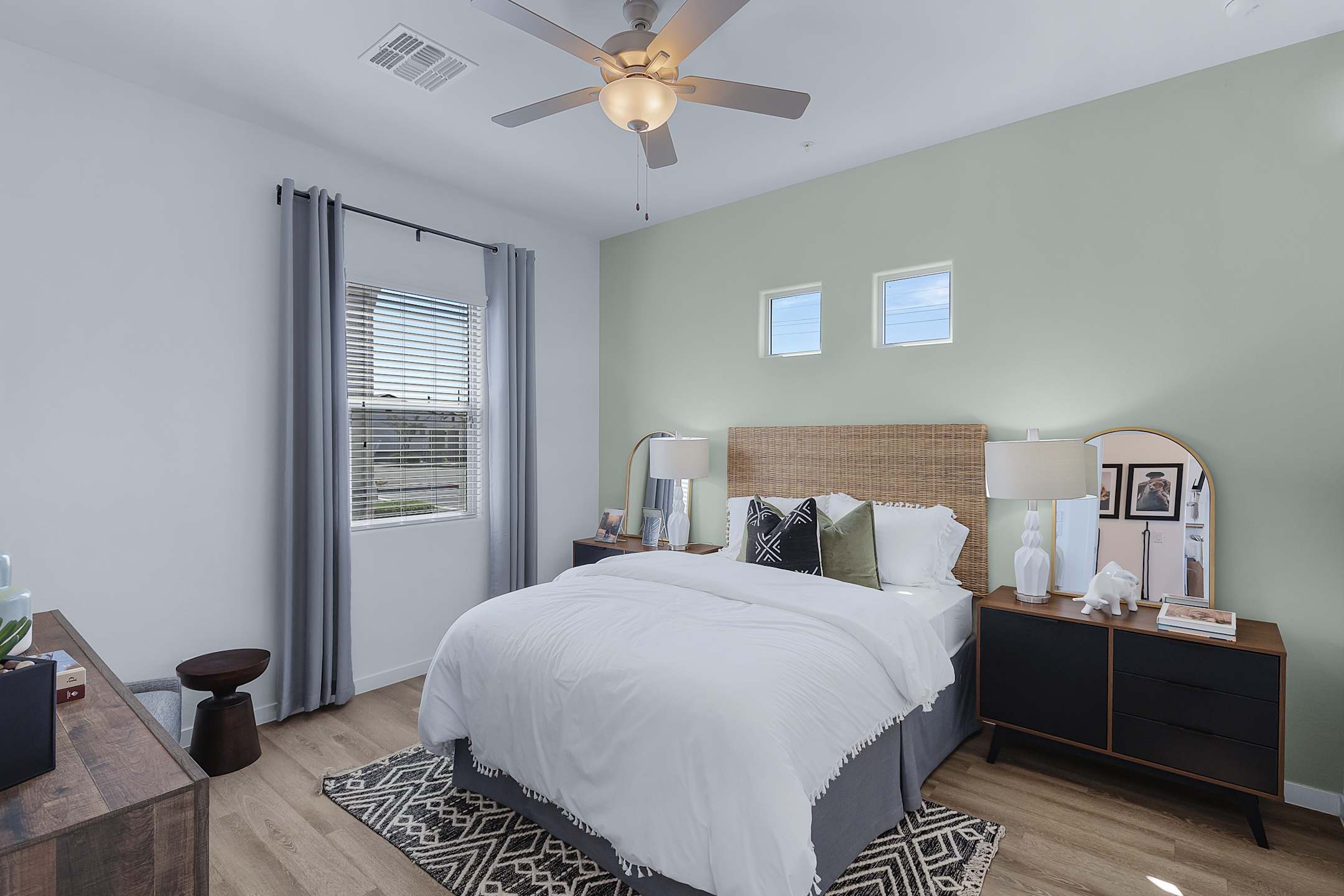 Furnished bedroom shown — representative home at Avilla Magnolia.