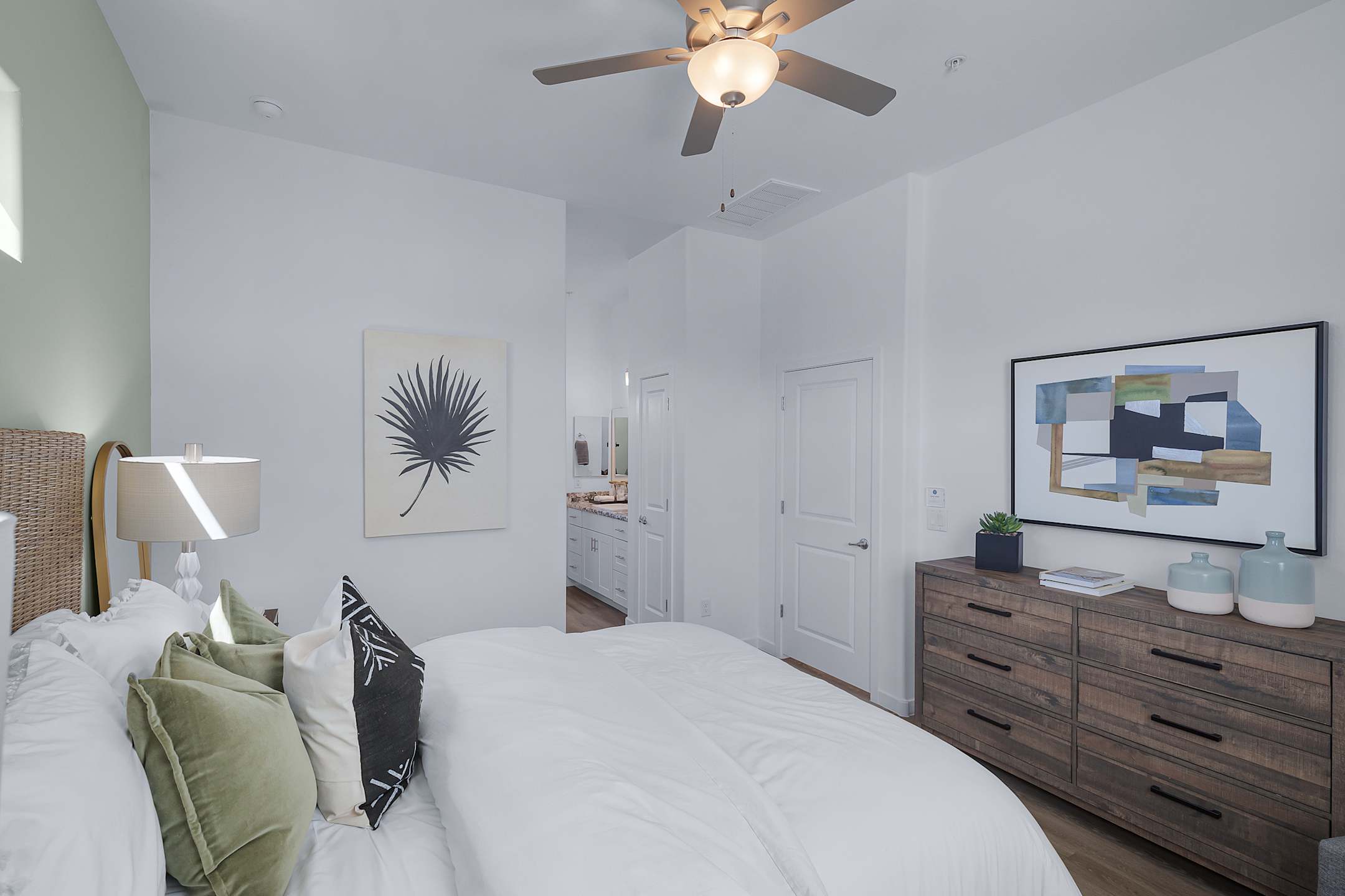 Furnished bedroom shown — representative home at Avilla Magnolia.