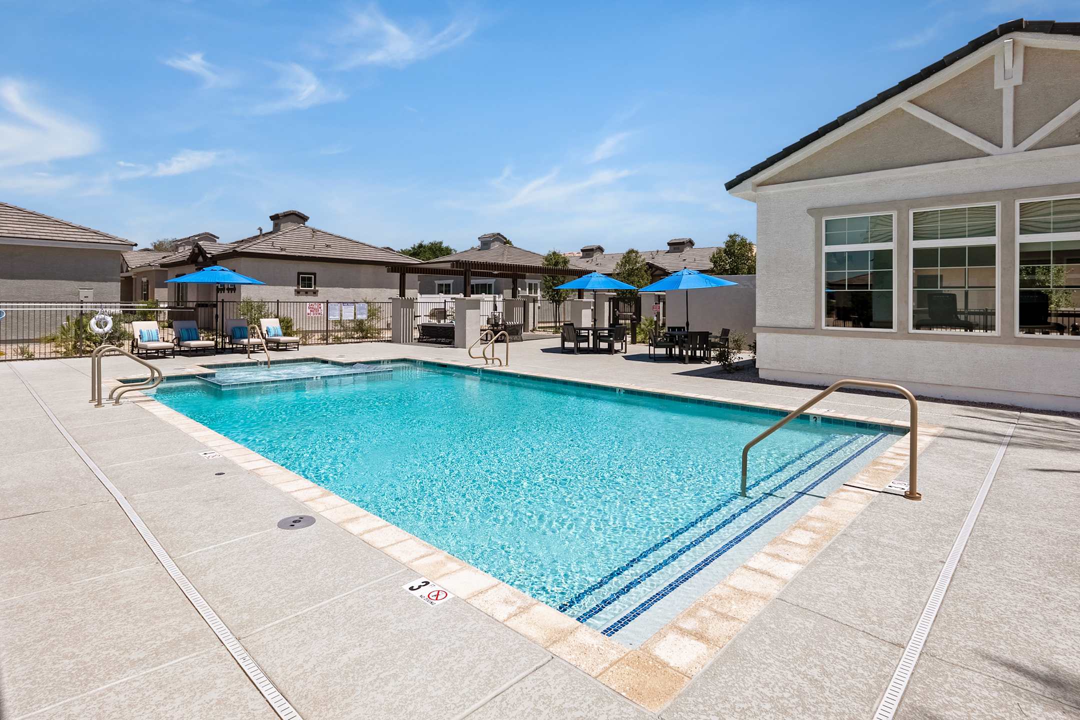 Pool and poolside area at Zora Encanto.