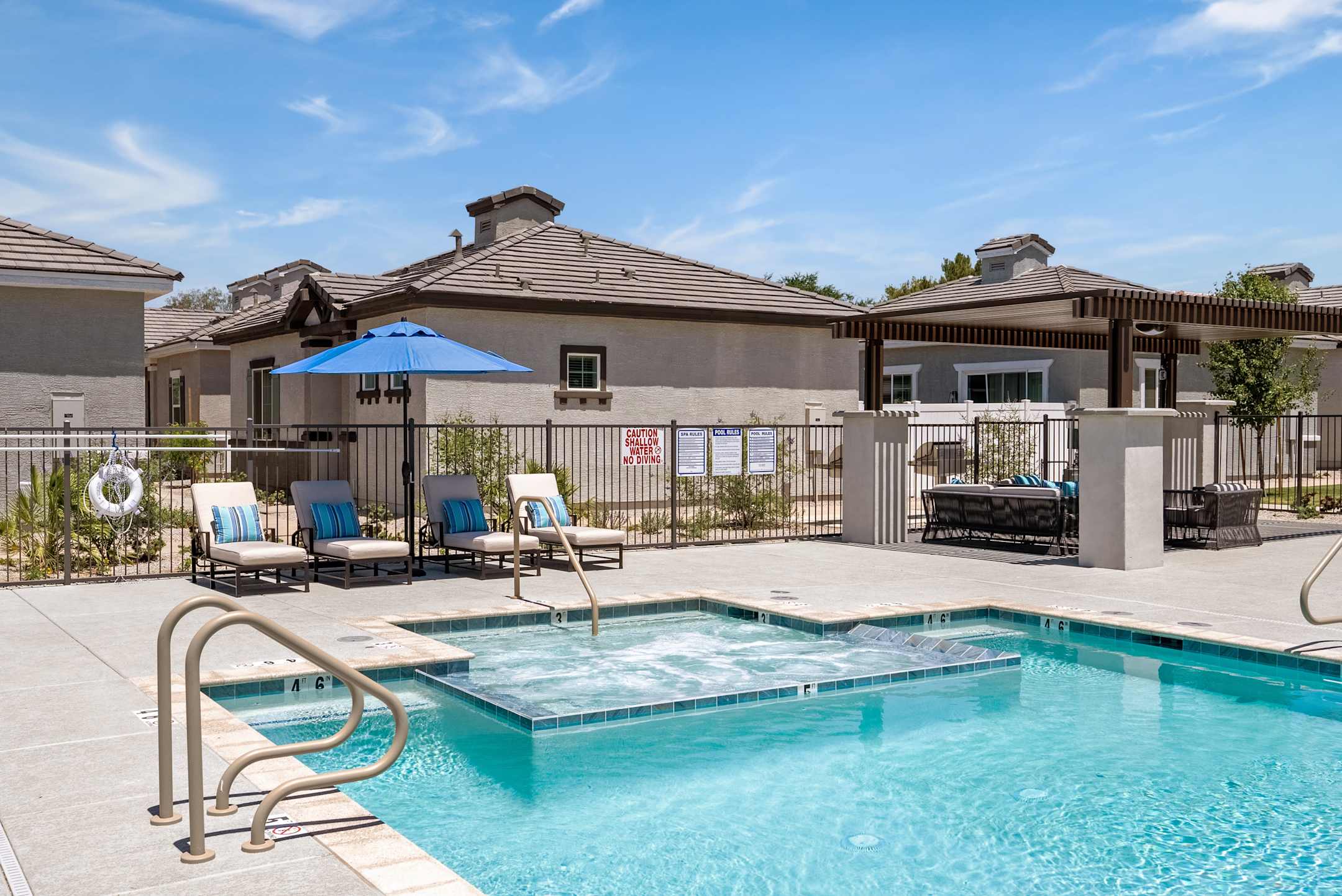 Pool and poolside area at Zora Encanto.