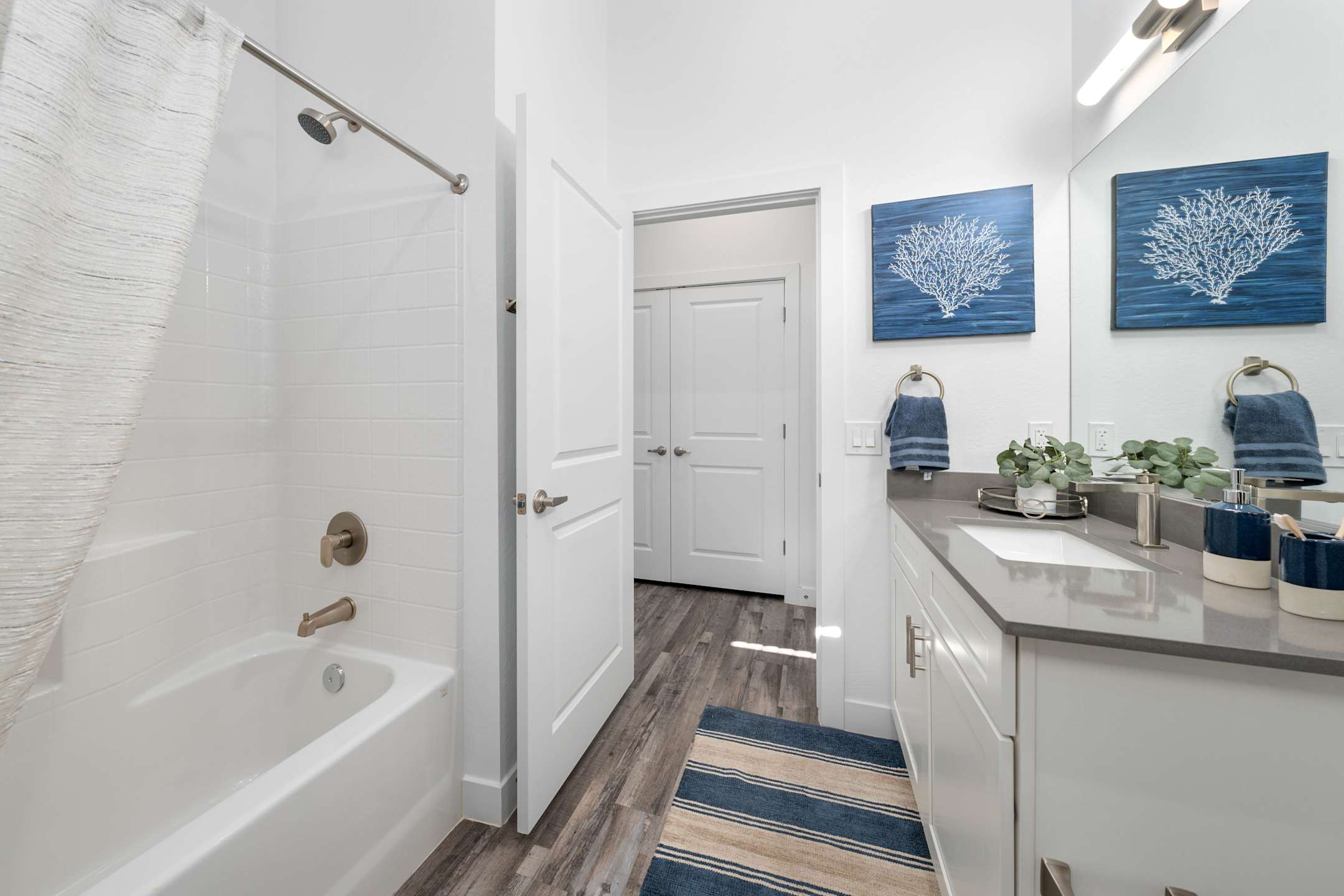 Apartment bathroom — representative home at Allero 59.