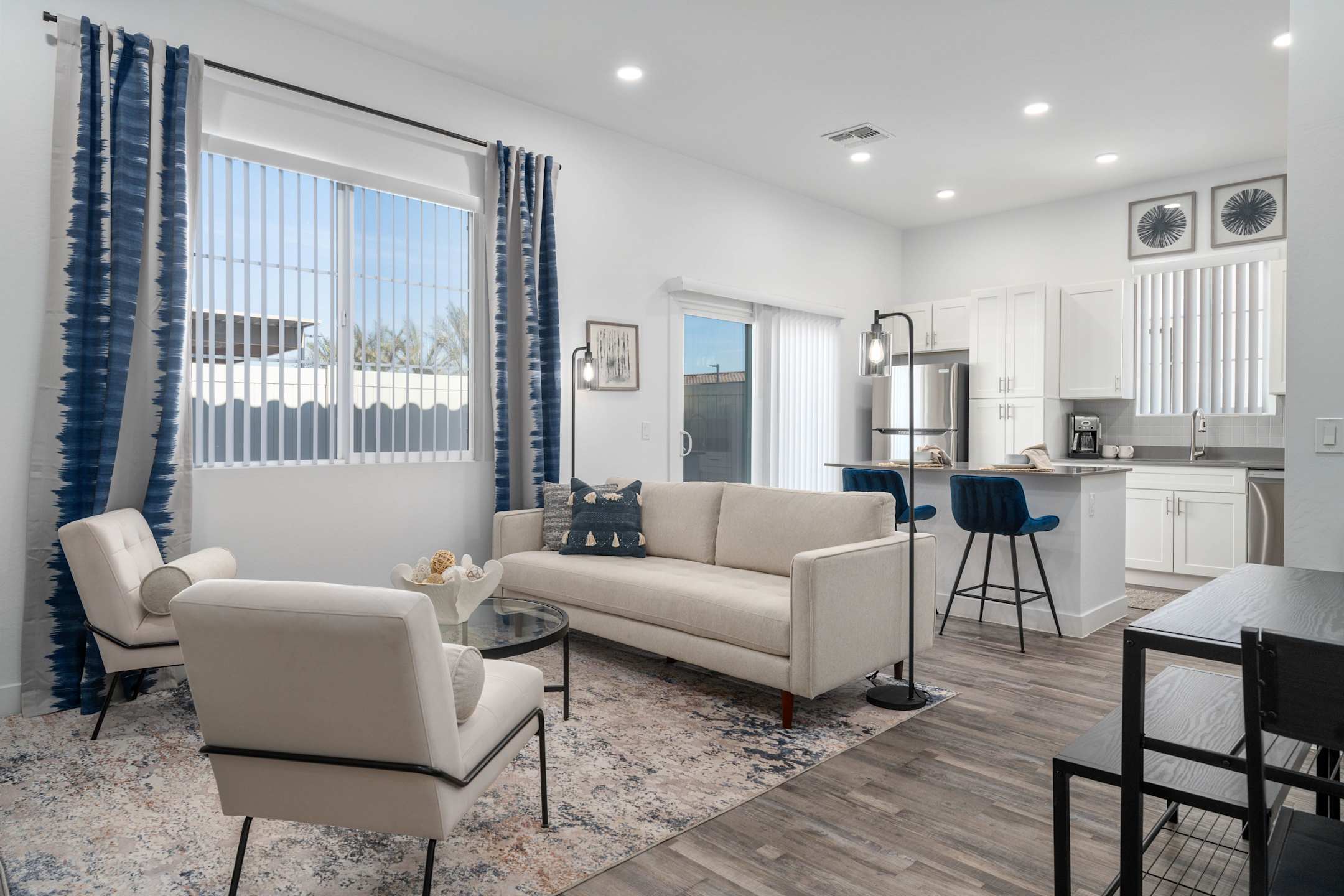 Furnished apartment living area shown — representative home at Allero 59.