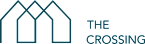 A graphic with three houses and the words "The Crossing" written to the right.