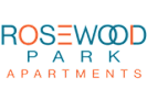 The image shows the text "Rosewood Park Apartments" in stylized font with a green background.