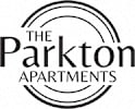 The logo for The Parkton Apartments consists of a circular design with the text "The Parkton Apartments" written inside.