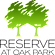 A logo with two trees and the words "Reserve at Oak Park".