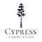 A logo with a tree and the words "Cypress Communities" written underneath it.