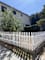 a white picket fence in front of a house
