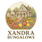 A house surrounded by flowers with the words Xandra Bungalows written below it.