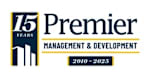 A logo for Premier Management & Development celebrating 15 years from 2010 to 2025.