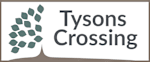 A logo with a tree and the words "Tysons Crossing" in the middle.