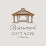 A logo for Brianwood Cottages of Menasha features a gazebo.
