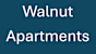 A blue sign with the words Walnut Apartments.