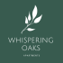 the logo for whispering oaks apartments