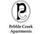 A logo with a circular design and the words "Pebble Creek Apartments" below it.