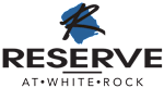 A logo with the text "RESERVE AT WHITE ROCK" with a stylized mountain and water design.