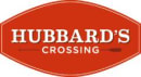 a red stop sign with the words hubbards crossing
