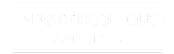 A sign that says Irving Schoolhouse Apartments.