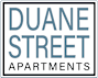 a white sign with the words dune street apartments