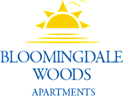 Bloomingdale Woods Apartments Valrico Florida Logo With Sun Setting and Water Ripples and Birds in distance