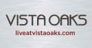 a white wall with a company logo and the word visaacks