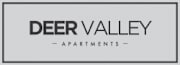 A sign that says "Deer Valley Apartments" is displayed.