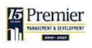 A logo for Premier Management & Development celebrating 15 years from 2010 to 2025.