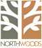 A logo with the words "North Woods" and a stylized tree design.