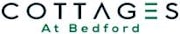 The image shows a logo with the text "COTTAGES At Bedford".
