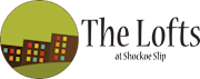 a logo of the lofts at shaker slip