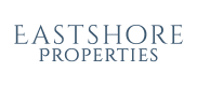 a green background with the words east shore properties on it