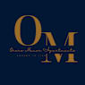 a gold o and q on a blue background with a gold and blue logo