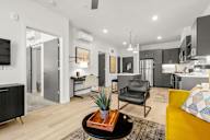 a living room with a couch and a table