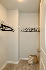 a closet with shelves and a basket on the floor at Herrin Farms, Auburn, GA, 30011