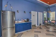 Bloomingdale Woods Apartments Valrico Florida Clubhouse Interior with Refrigerator, Coffee Nook, and Seating Area