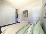 a bedroom with a large bed and a closet at Summer Meadows, Riverside, CA, 92507