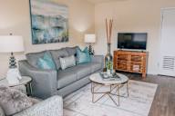 a living room with a couch and a television