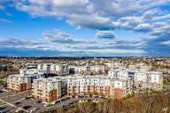 an aerial view of apartment buildings in a city