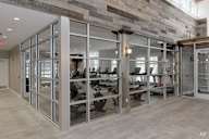 a large display case in a room with glass doors