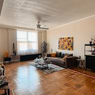 a living room with a couch and a coffee table
